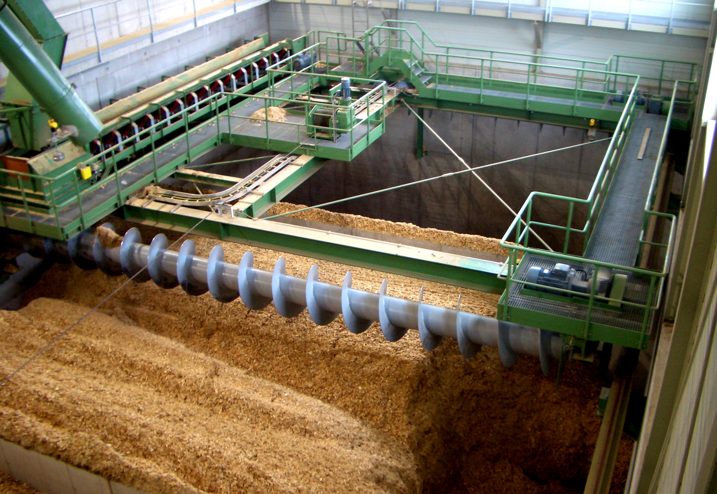 FMW Longitudinal Discharge Screw in a Biomass Storage